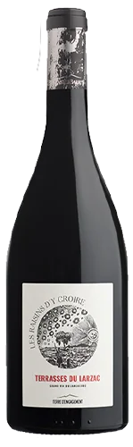 Packshot de la bouteille de rouge 'Les Raisins d'y Croire' AOP Terrasses du Larzac sur fond blanc. Bouteille entière (pas une étiquette plate), correcte mais studio classique.